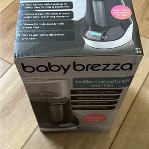 NWT Baby Breeza bottle and breast milk warmer